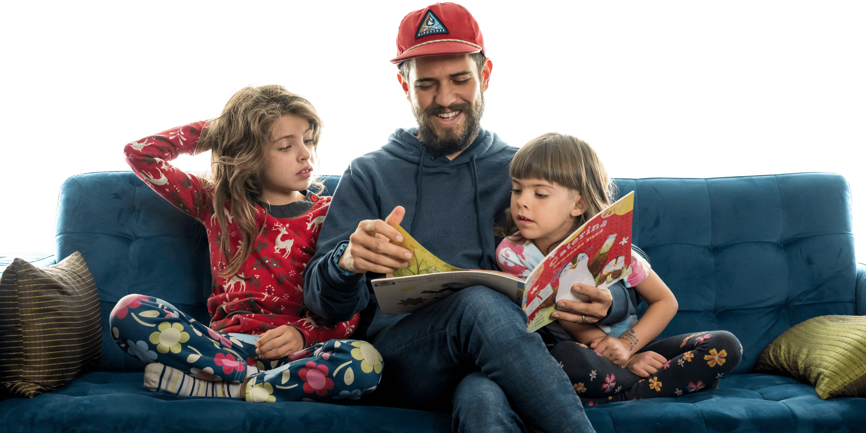 An image of a family enjoying a book